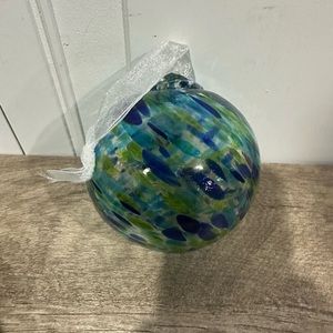 Blue & Green Glass bulb ornament, roughly 4” diameter, with black storage box